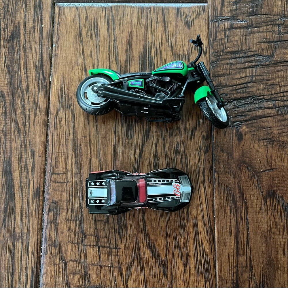 Green and Black Toy Motorcycle Set